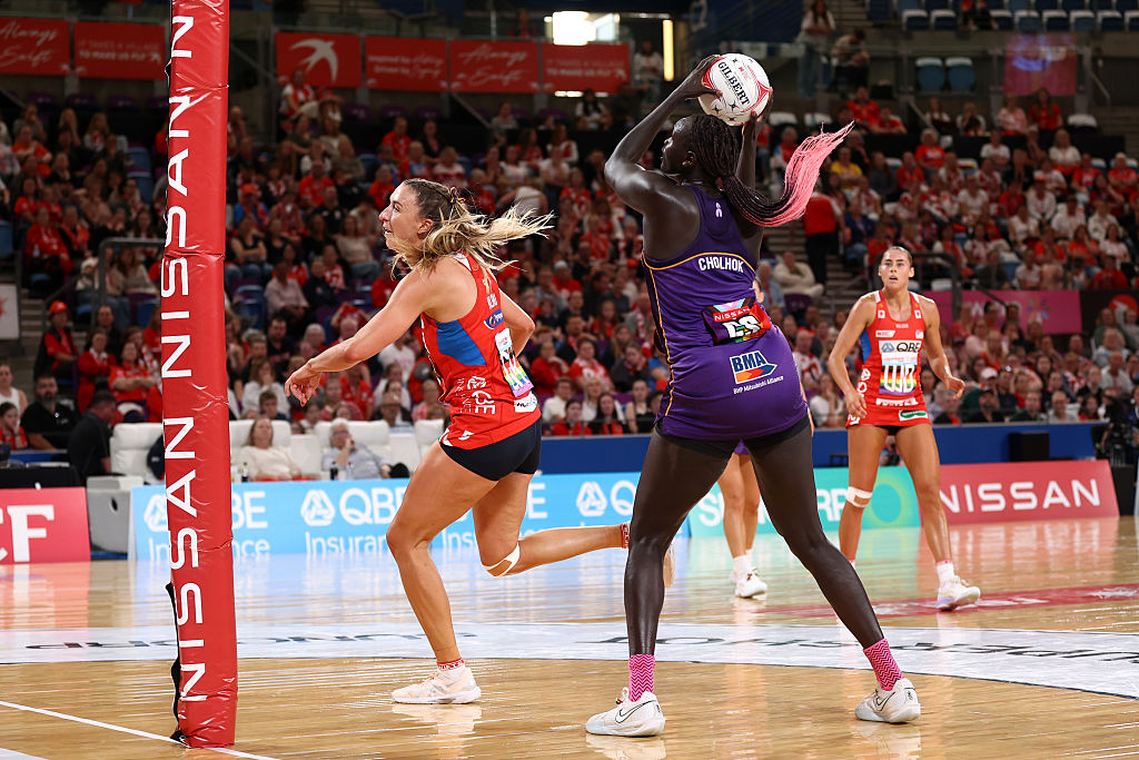 Mary Cholhok secures the ball