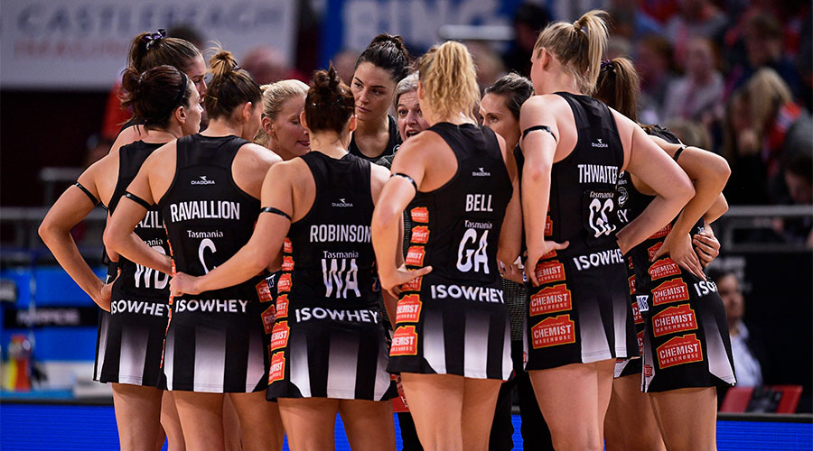Collingwood Magpies in a team huddle