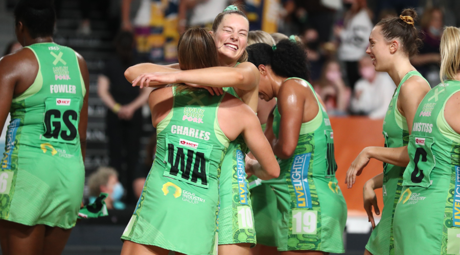 Fever players celebrate during the Super Netball Semi-Final 2 match between Fever and Sunshine Coast Lightning at Nissan Arena in Brisbane, Saturday , August 14, 2021.