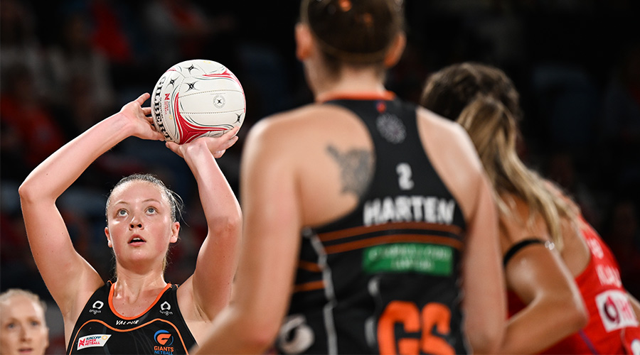 Sophie Dwyer of the Giants scores a goal during the round 1 Super Netball match between the NSW Swifts and Giants Netball at Ken Rosewall Arena in Sydney, Saturday, March 26, 2022.