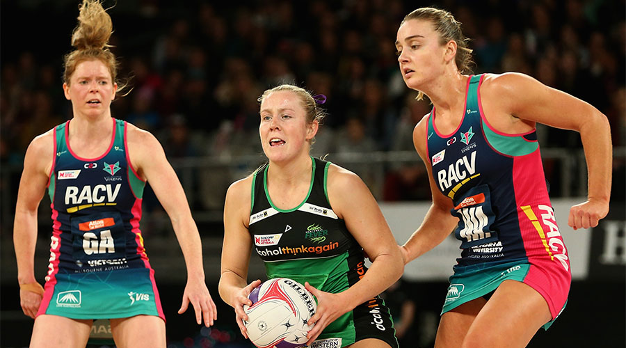 Jess Anstiss with the ball in a game against the Vixens