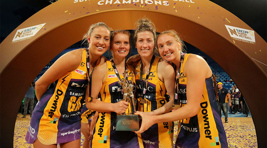Lightning team with the trophy after their 2018 grand final win