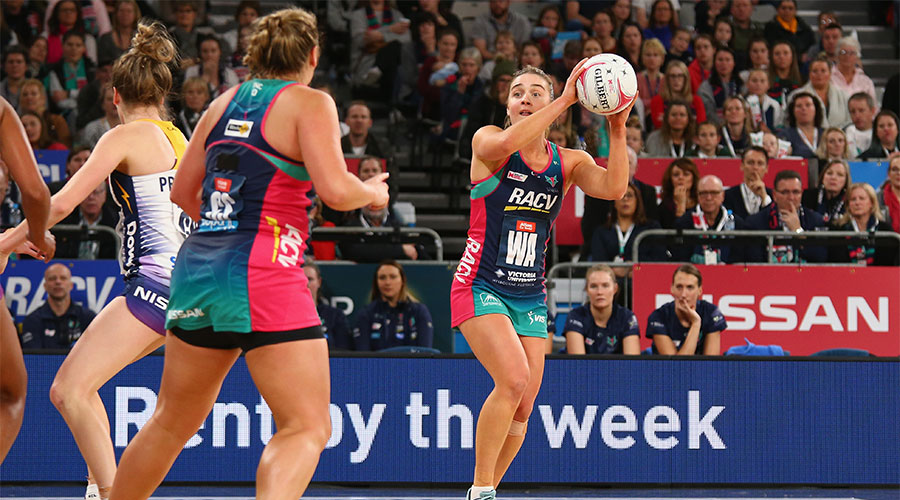 Liz Watson looking to pass the ball against Lightning