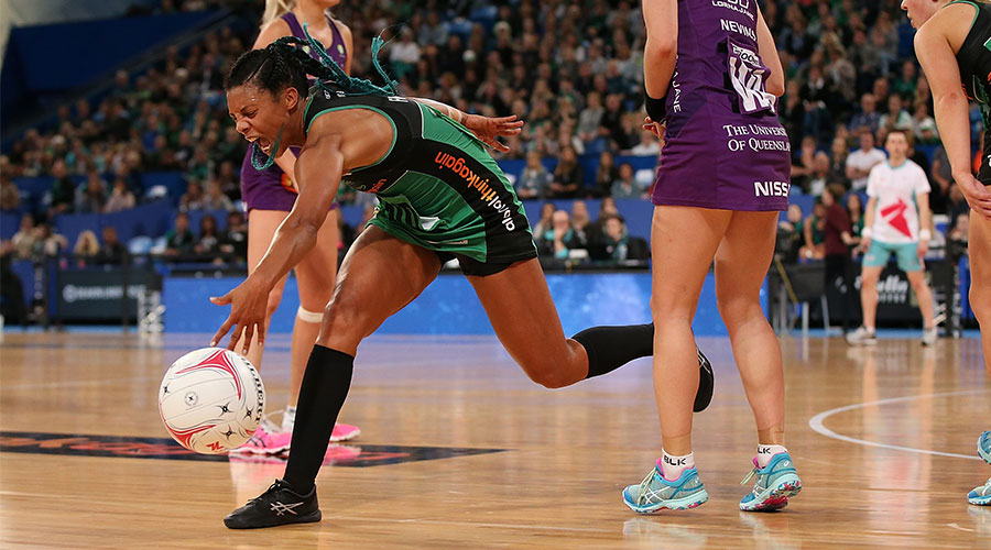 Stacey Francis running for the ball against Firebirds defenders