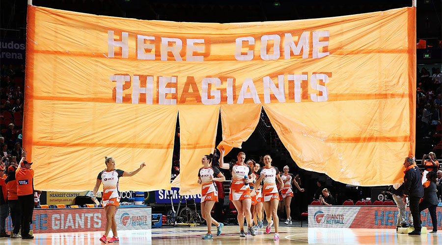 The Giants running through the banner during the 2018 finals