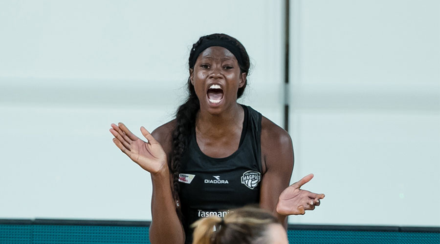 Shimona Nelson cheering on her team on court