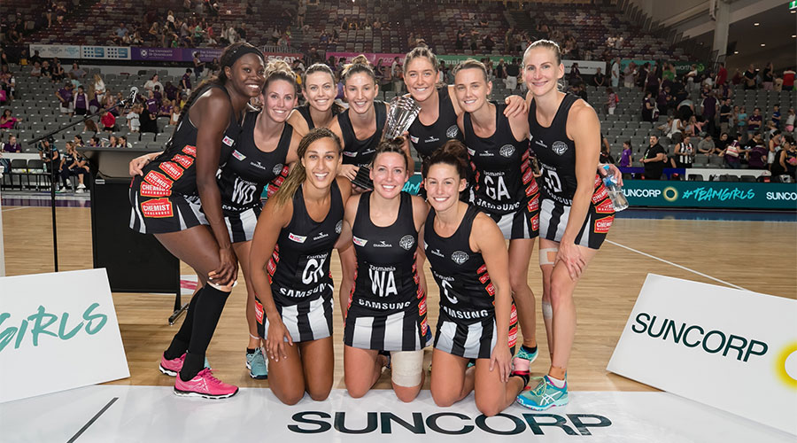 Team photo of the Collingwood Magpies after winning the 2019 Team Girls Cup