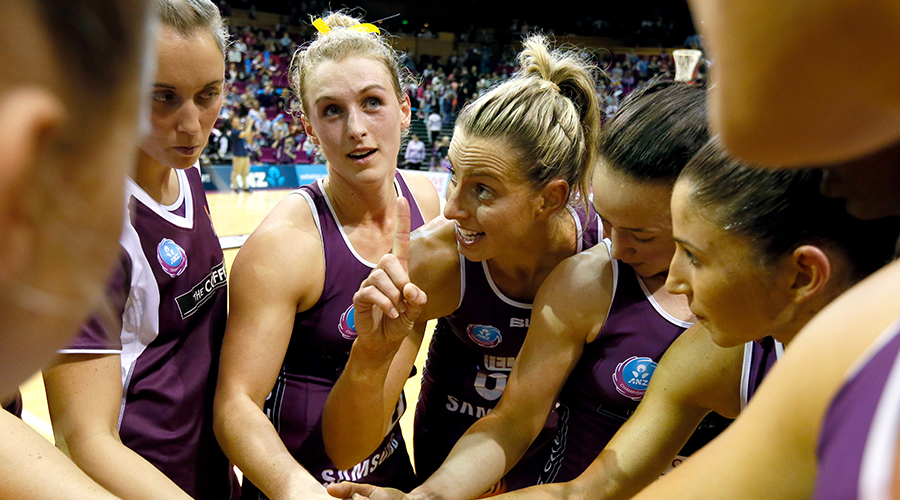 Laura Geitz speaks to her Queensland Firebirds teammates after the ANZ Championship match against the West Coast Fever in 2016.