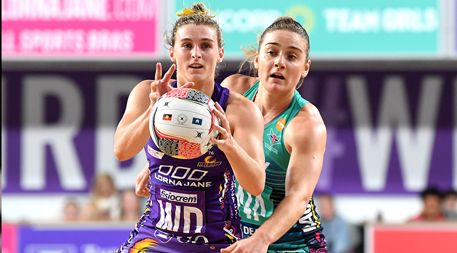 Queensland Firebirds captain Gabi Simpson takes possession of the ball infront of Liz Watson of the Melbourne Vixens in their match in Round 8 at QSNC.