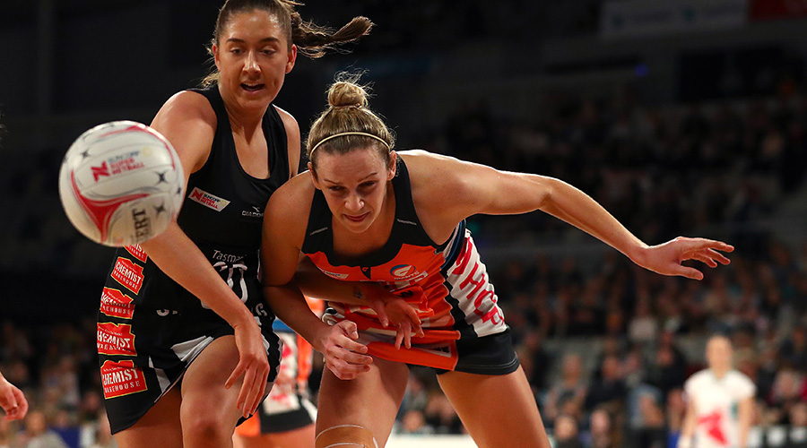 Jo Harten clashes with Matilda Garrett as the Magpies take on the Giants in Round 10