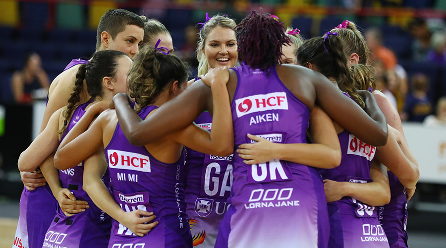 Gretel Tippett and the Firebirds huddle during the round three Super Netball match between the Sunshine Coast Lightning and the Queensland Firebirds at Brisbane Arena on May 12, 2019 in Brisbane, Australia. 