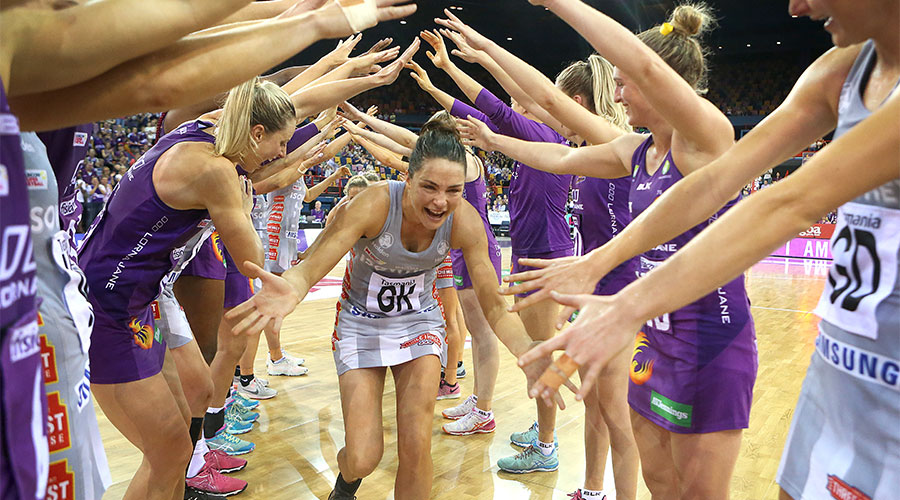 Sharni Layton being farewelled by the Magpies and Firebirds team after playing her last game of professional netball