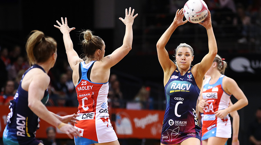 Kate Moloney of the Melbourne Vixens plays against the NSW Swifts