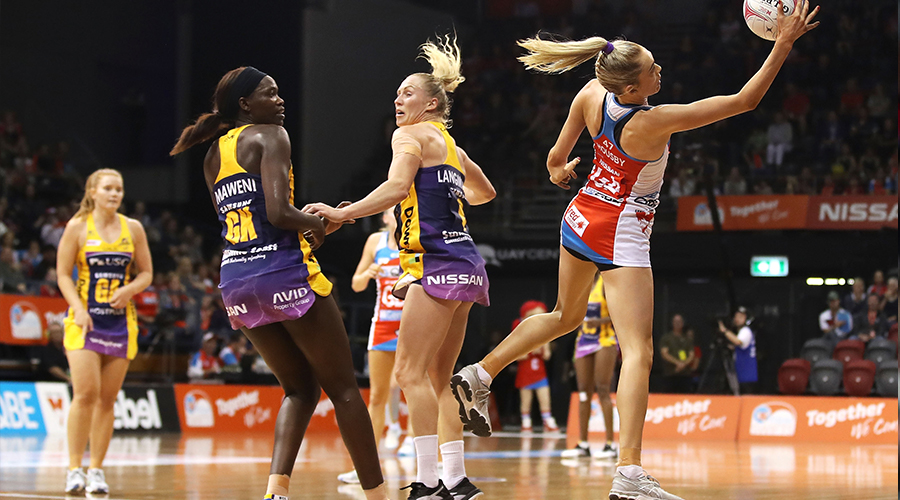 Helen Housby of the Swifts stretches for the ball during the Super Netball Rd 4 - Swifts v Lightning at Quay Centre on May 18, 2019 in Sydney, Australia.