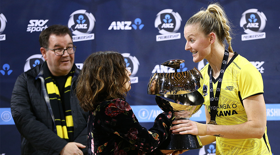ANZ Representative Sarina Pratley hands the ANZ Premiership trophy to Katrina Rore of the Pulse during the ANZ Premiership Netball Final between the Pulse and the Stars at Te Rauparaha Arena on June 03, 2019 in Wellington, New Zealand. 