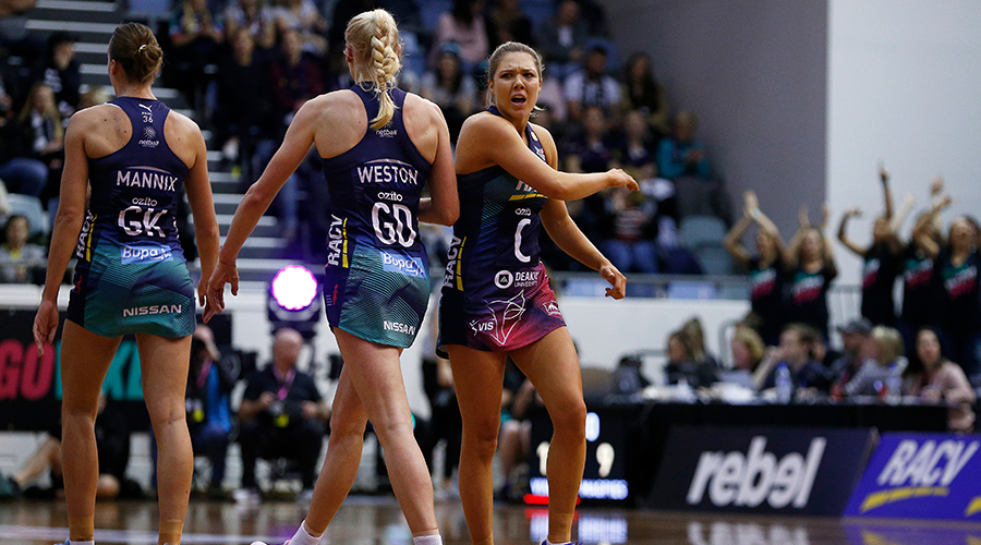 Kate Moloney of the Vixens (R) celebrates with teammates during the Super Netball Minor Semi Final match between the Melbourne Vixens and the Collingwood Magpies at the State Netball and Hockey Centre on September 01, 2019 in Melbourne, Australia.