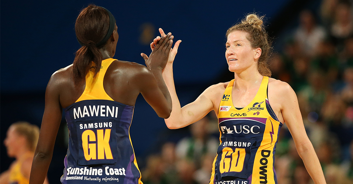 Phumza Maweni and Karla Pretorius of the Lightning high five at the half time break during the round two Super Netball match between the Perth Fever and the Sunshine Coast Lightning at RAC Arena on May 05, 2019 in Perth, Australia.