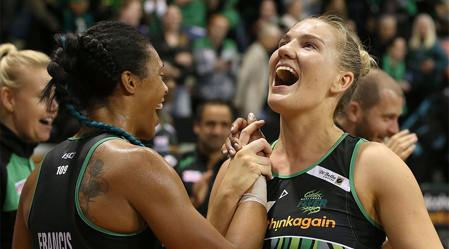 Stacey Francis and Courtney Bruce laughing and celebrating after a win