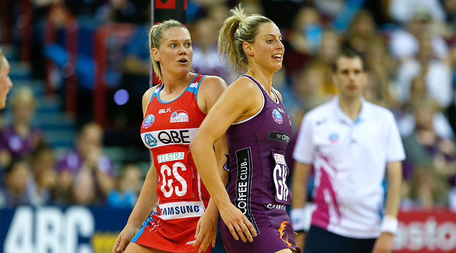 Caitlin Thwaites and Laura Geitz playing on each other in the 2016 Grand Final
