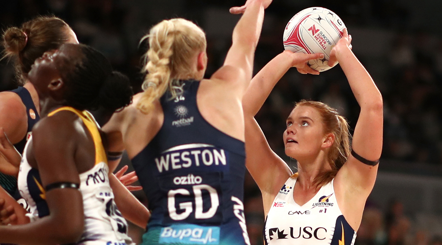 Steph Wood of the Sunshine Coast Lightning takes aim at the goals against the Melbourne Vixens.