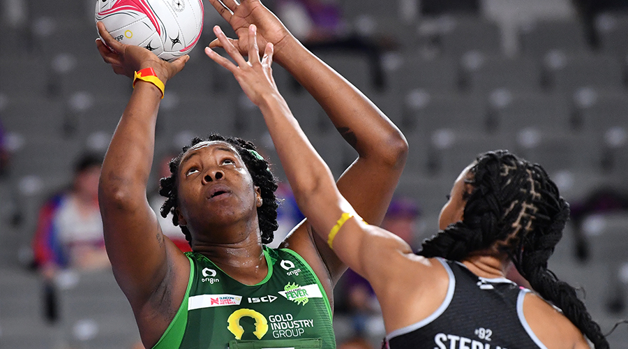 Jhaniele Fowler (left) of the Fever shoots for goal during the Round 1 Super Netball match between the Adelaide Thunderbirds and West Coast Fever at Nissan Arena in Brisbane, Saturday, August 1, 2020.