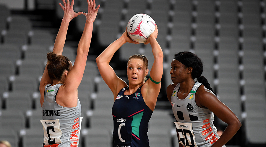 Kate Moloney of the Vixens (centre) in action during the Round 1 Super Netball match between the Melbourne Vixens and Collingwood Magpies at Nissan Arena in Brisbane, Sunday, August 2, 2020.
