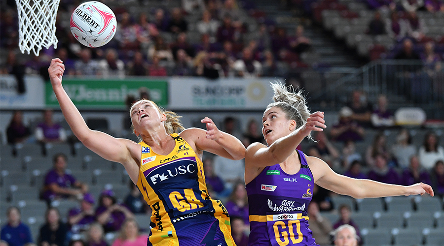 Stephanie Wood (left) of the Lightning contests for the ball against Kim Jenner (right) of the Firebirds during the Round 1 Super Netball match between the Queensland Firebirds and Sunshine Coast Lightning at Nissan Arena in Brisbane, Saturday, August 1, 2020.