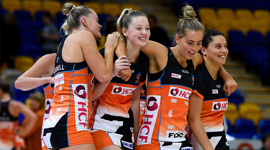 Giants players (L-R) Matilda McDonell, Sophie Dwyer, Matisse Letherbarrow and Claire O’Brien celebrate their victory during the Round 11 Super Netball match between the GWS Giants and the Collingwood Magpies at USC Stadium, Sunshine Coast, Wednesday, September 9, 2020. 