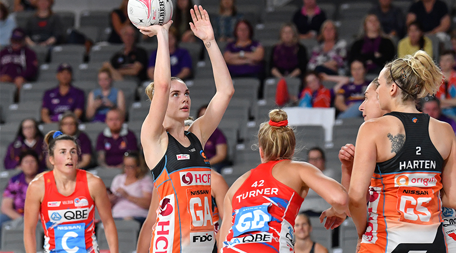 Kiera Austin (centre) of the Giants shoots for goal during the Round 14 Super Netball match between the NSW Swifts and GWS Giants at Nissan Arena in Brisbane, Saturday, September 26, 2020.