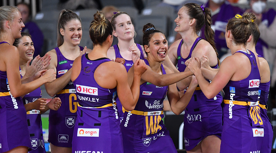 Jemma Mi Mi (centre) of the Firebirds is seen with team mates during the Round 9 Super Netball match between the West Coast Fever and Queensland Firebirds at Nissan Arena in Brisbane, Wednesday, September 2, 2020.