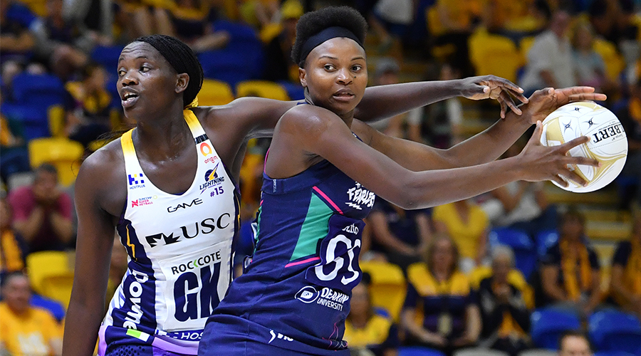 Phumza Maweni of the Lightning (L) and Mwai Kumwenda of the Vixens in action during the Major Semi-Final Super Netball match between the Melbourne Vixens and the Sunshine Coast Lightning at USC Stadium on the Sunshine Coast, Saturday, October 3, 2020. 