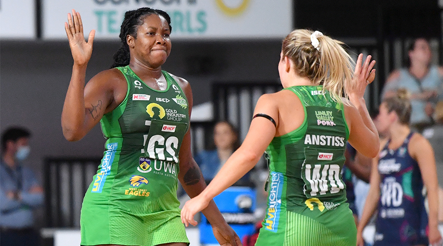 Jhaniele Fowler (left) of the Fever celebrates shooting a goal with team mate Jess Anstiss (right) during the Super Netball Grand Final between the Melbourne Vixens and West Coast Fever at Nissan Arena in Brisbane, Sunday, October 18, 2020.