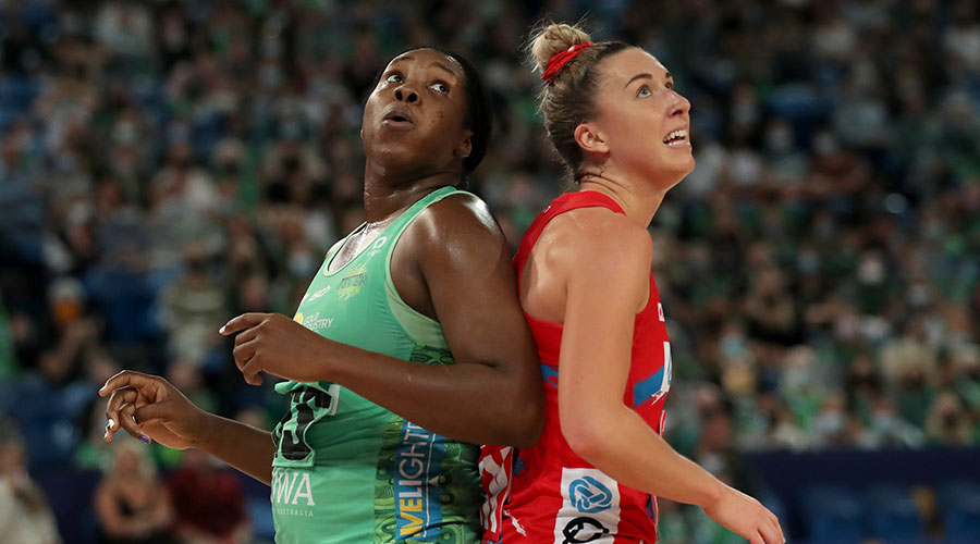 Jhaniele Fowler of the Fever and Sarah Klau of the Swifts compete for the ball during the Round 2 Super Netball match between the West Coast Fever and the NSW Swifts at RAC Arena in Perth, Saturday, May 8, 2021.
