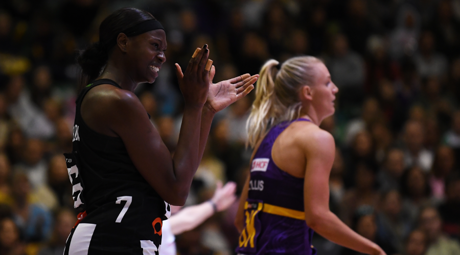 Shimona Nelson of the Magpies (left) reacts after scoring a goal during the Round 4 Super Netball match between the Collingwood Magpies and the Queensland Firebirds at the Silverdome in Launceston, Saturday, May 22, 2021.