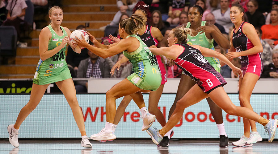 Verity Charles of the Fever under pressure from Hannah Petty of the Thunderbirds during the Round 4 Super Netball match between the Adelaide Thunderbirds and the West Coast Fever at the Netball SA Stadium in Adelaide, Saturday, May 22, 2021.
