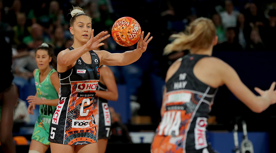 Jamie-Lee Price of the Giants passes the ball during the Round 5 Super Netball match between the West Coast Fever and GWS Giants at RAC Arena in Perth, Monday, May 31, 2021.