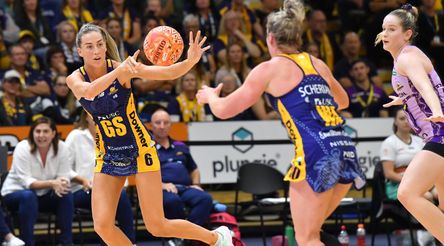 Cara Koenen (left) of the Lightning in action during the Round 6 Super Netball match between the Sunshine Coast Lightning and Queensland Firebirds at USC Stadium on the Sunshine Coast, Sunday, June 6, 2021. 