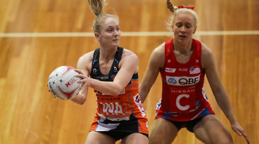 Maddie Hay of the Giants and Tayla Fraser of the Swifts during the Super Netball Round 11 match between NSW Swifts and GWS Giants at Netball SA Stadium in Adelaide, Saturday, July 17, 2021.