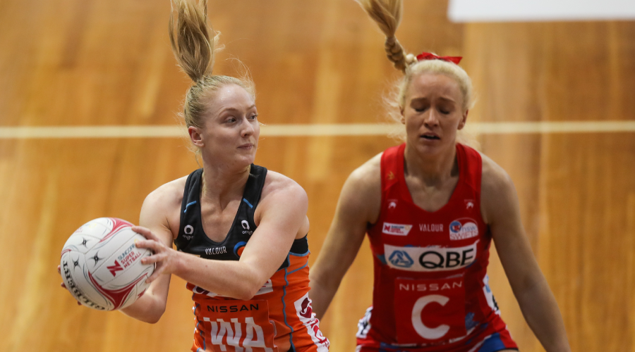Maddie Hay of the Giants and Tayla Fraser of the Swifts during the Super Netball Round 11 match between NSW Swifts and GWS Giants at Netball SA Stadium in Adelaide, Saturday, July 17, 2021. 