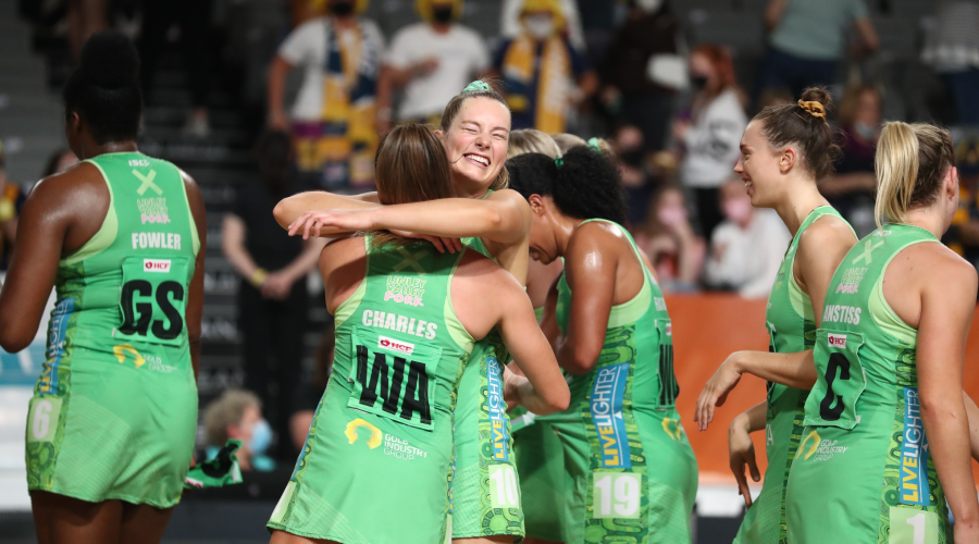 Fever players celebrate during the Super Netball Semi-Final 2 match between Fever and Sunshine Coast Lightning at Nissan Arena in Brisbane, Saturday , August 14, 2021. 