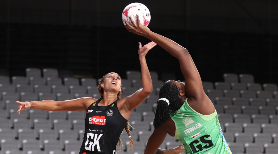 Jhaniele Fowler of the Fever in action with Geva Mentor of the Magpies during the Round 13 Super Netball match between the West Coast Fever and Collingwood Magpies, at Nissan Arena, Brisbane, Tuesday, August 3, 2021.