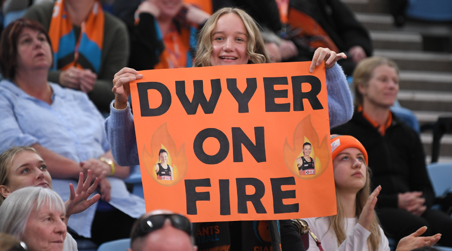 A fan holding a ‘Dwyer on Fire’ sign during the Round 7 Super Netball match between GWS Giants and Sunshine Coast Lightning at Ken Rosewall Arena in Sydney, Saturday, June 12, 2021. (