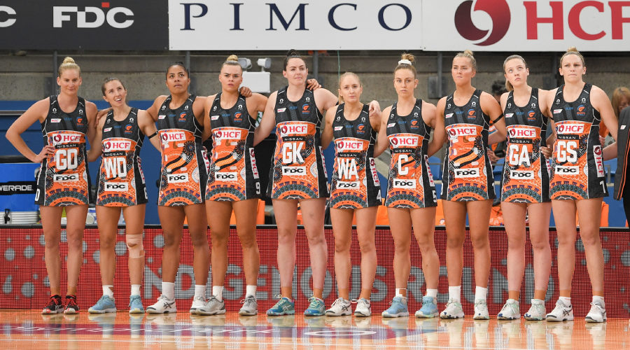 The Giants observing the welcome to country ahead of the Round 6 Super Netball match between the GWS Giants and NSW Swifts at Ken Rosewall Arena in Sydney, Sunday, June 6, 2021.