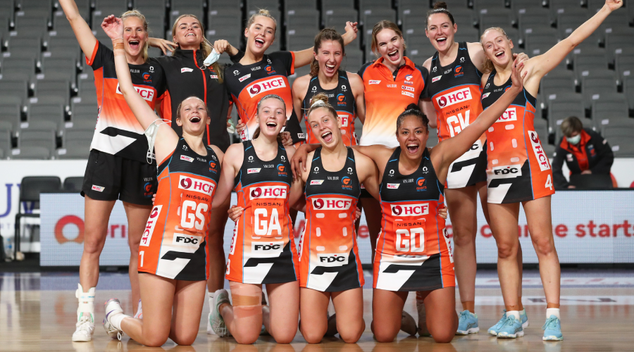 Giants players celebrate winning the Monor Premiership during the Super Netball Round 14 match between West Coast Fever and GWS Giants at Nissan Arena in Brisbane, Saturday , August 7, 2021.