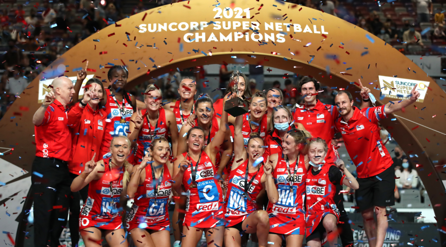Swifts players celebrate winning the Super Netball Grand Final match between the Sunshine Coast Lightning and the New South Wales Swifts at the Brisbane Entertainment Centre in Brisbane, Sunday, September 15, 2019.