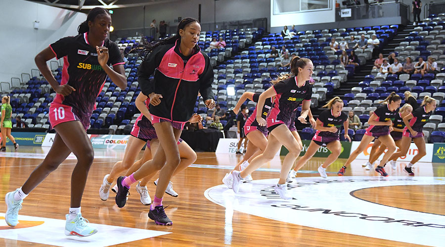 Thunderbirds players warm up before the match between the Adelaide Thunderbirds and West Coast Fever on Day 2 of the Super Netball: Team Girls Cup at Parkville Stadium, in Melbourne, Saturday, February 26, 2022.