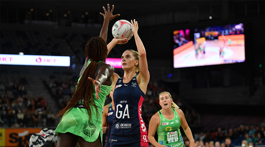 Kiera Austin of the Vixens (centre) in action during the Round 4 Super Netball match between the Melbourne Vixens and West Coast Fever at John Cain Arena, Melbourne Tuesday, April 12, 2022.