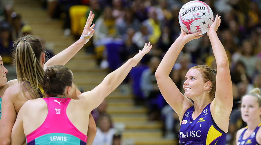 Steph Wood of the Lightning shoots the ball during the Super Netball Round 5 match between the Sunshine Coast Lightning and the Melbourne Vixens at USC Stadium on the Sunshine Coast, Saturday, April 16, 2022. 