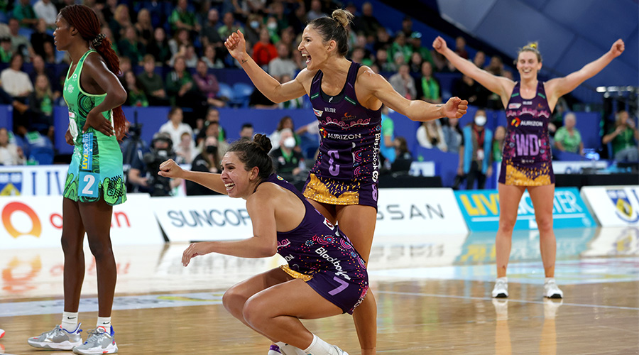 Jemma Mi Mi and Kim Ravaillion of the Firebirds celebrate after winning the Super Netball Round 12 match between the West Coast Fever and the Queensland Firebirds at RAC Arena in Perth, Saturday, May 28, 2022.