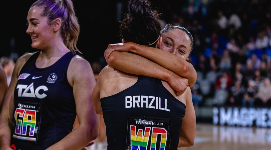 Ash Brazill and Molly Jovic embrace after a win over the Firebirds
